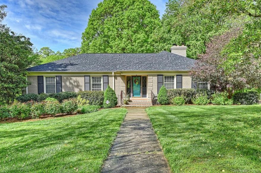 Absolutely beautiful ! updated and immaculate. Walk out basement with stacked stone fireplace, built in cabinets and a 849 sq. ft. backload garage. Kitchen updated w/granite, new door fronts on cabinets, 5 burner gas/convection range, desk area and pantry storage. All bathrooms have been updated, Roof 2012. House has been wired with Cat 5 HDMI Crosspoint with remote that remains. Large deck w/new awning off breakfast area in kitchen. Large .49  lot with privacy. Neighborhood has 2 swim clubs