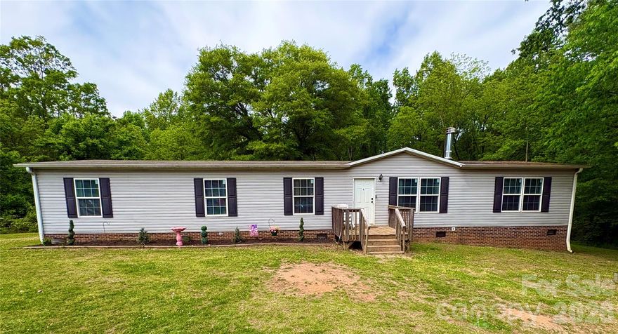 Welcome to this generously sized 4 bedroom/2 bathroom home offering comfort, space and versatility! Featuring two separate living areas, spacious bedrooms and large eat in kitchen. Situated on a large lot with private backyard and huge deck with gazebo and TV, great for entertaining! Conveniently located with easy access to Gastonia, Kings Mountain or Shelby. 
Seller offering $2000 carpet allowance with acceptable offer. Call today to schedule showing!