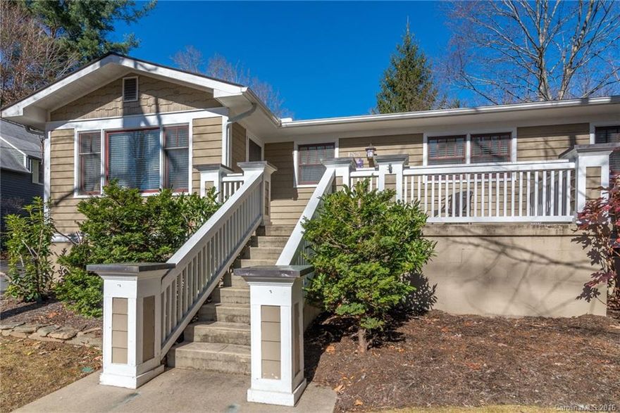 Enjoy easy access and convenience to Montreat, Black Mountain, and Asheville. This nicely renovated home features one level living, with hardwood floors, brick fireplace with gas, front porch, back porch, and an open floor plan. 3BR's, 2BA on main level. One bedroom/den/office downstairs. Backyard has a nice 12 x 20 building that can be used for a shop, studio, etc. with chimney/flue for wood stove. Heat pump for central heat and A/C. Southeastern exposure and on level paved road.