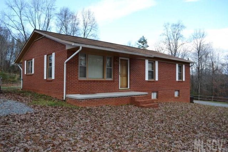 Conveniently located to schools, I-40, downtown, and so much more, this 3BR/1BA brick ranch with full basement is move-in ready. Spacious kitchen with large pantry has room for dining table. Living room features large window allowing lots of natural light and beautiful hardwood floors. Three gracious-sized bedrooms with large closets, all on main level. Large full bath with shower/tub combo and great vanity. Full, clean unfinished basement has flue for woodstove. Gas heat. Central air. Appliances remain with home. Easy to show!