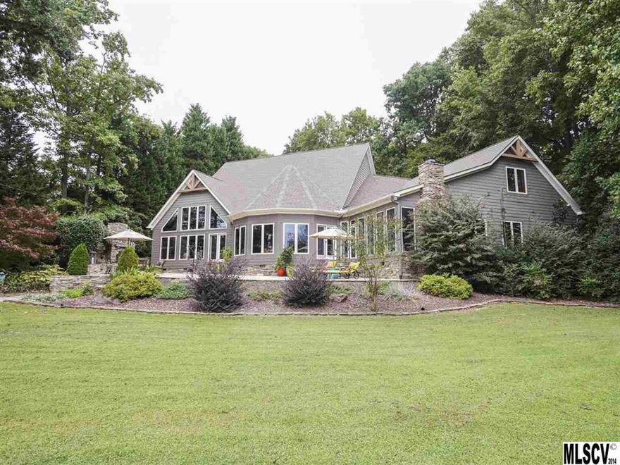 Time to appreciate the incredible, breath-taking mile-long main channel view for this truly custom built home that is situated on a 3 +/- acre park like lot. 214' of rip-rapped shoreline, gazebo, covered boat dock, and private ramp. Outdoor kitchen with stone fireplace and pizza oven. Large windows, barn oak hardwood flooring, vaulted great room and a large dining room with 12 sided knotty pine ceiling, Den/Office, fireplaces, A truly one of a kind property that must be seen to appreciate.