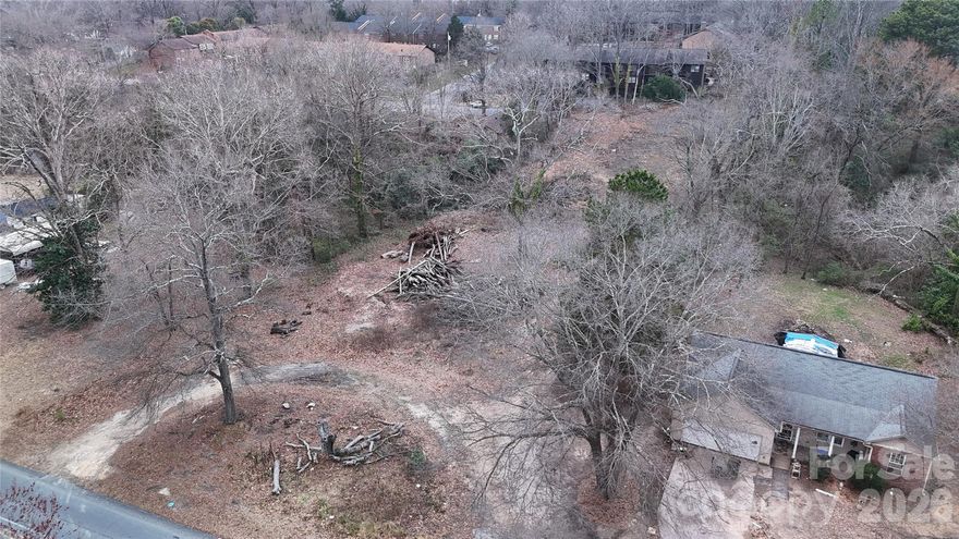 Clean and cleared 0.81-acre development opportunity, formerly part of a larger parcel and now offered separately. 
Zoned RS-8, allowing flexibility for residential development including single-family or attached products (buyer to verify with City). The adjoining 0.5-acre parcel is also available for purchase, mls:4347282 creating a combined 1.31-acre assemblage with potential to pursue multifamily rezoning, subject to City approval.
Excellent opportunity for builders and investors seeking scale, flexibility, and strong future upside in a growing area.