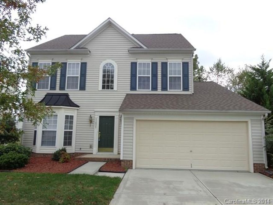This lovely two story two car garage home has trey/coffered ceilings, wood flooring, Formal Dining and Living Rooms and a fireplace in the Great Room. The warm and inviting kitchen has a breakfast bar, a kitchen island and a pantry.