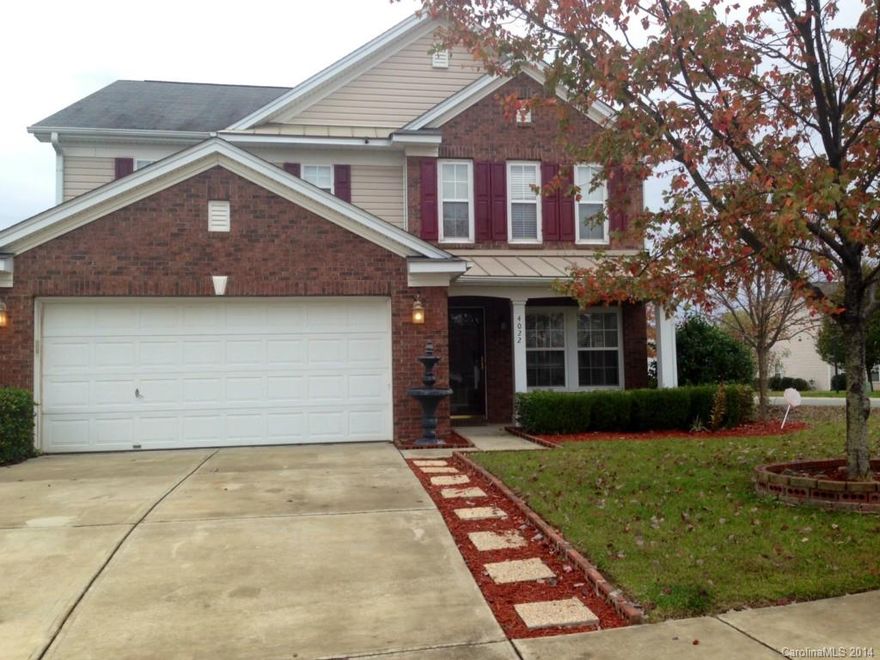 Beautiful spacious home on a corner lot, with tray ceiling in the Master Bedroom, Custom Built-ins in the master bedroom closet, open loft area, clean carpet and Sparkling like new laminate floors throughout, Bay window, wood blinds, Secured storm door, kitchen has black Refrigerator and stove with granite counter tops in the kitchen and bathroom, Irrigation system in back yard, water fountain in front yard, surveillance cameras in the home