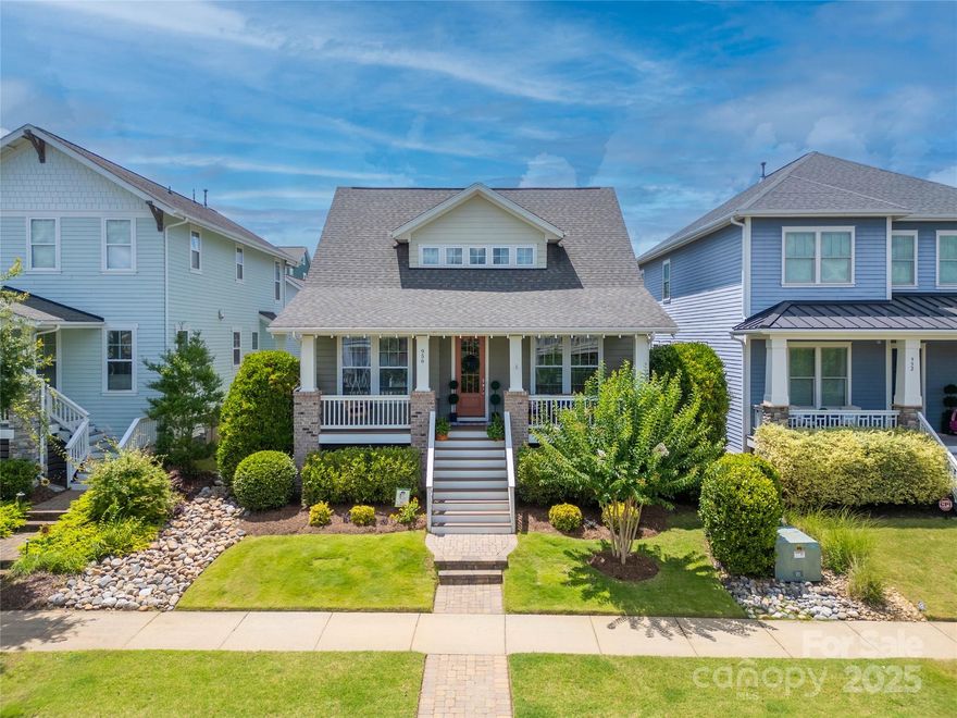 Charming Arts & Crafts-style home in highly desirable Riverwalk, a family-friendly community along the Catawba River. Built in 2015, this updated home features hardwood floors throughout the main living areas, beautiful trim work, and custom built-ins for added storage. The open-concept living room is filled with natural light, and the private patio is perfect for grilling, entertaining, or kids at play. The second-level primary bedroom and bathroom have been fully updated, offering a fresh, modern retreat. Riverwalk offers scenic trails, a community pool, playground, restaurants, shops, and river access—everything you need just steps away!