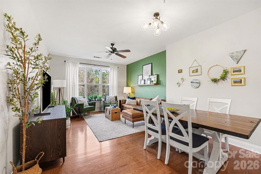 Lock and Leave 2 Bed 2 Bath condo in Preston Flats with convenient access to Park Road Shopping Center, SouthPark, Dilworth, and Uptown. This 1st floor unit features an updated kitchen with white cabinetry, stainless steel appliances, subway tile backsplash, and modern hex tile flooring. The open living and dining area offers hardwood floors and a functional layout ideal for everyday living and entertaining. Spacious bedrooms include a primary suite with an updated bath featuring designer tile and dual vanity. Additional highlights include a private balcony and access to community amenities including a pool and covered parking. Low-maintenance living in a convenient location. Ask about credits for HOA or other rate buy down needs.