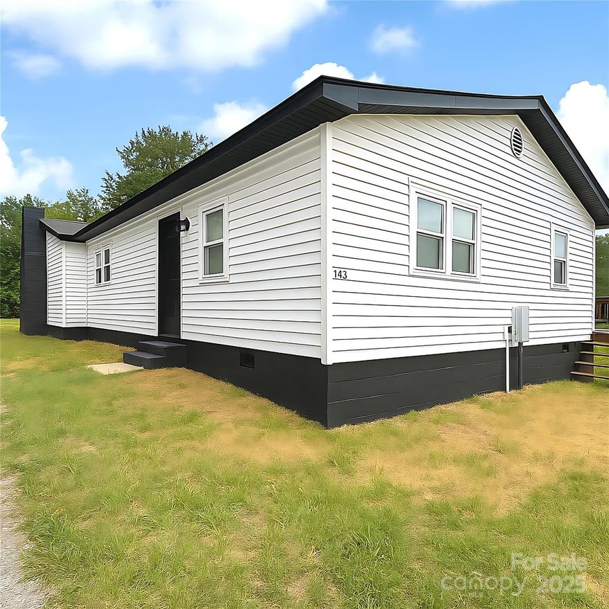 This fully renovated 3-bedroom, 2-bath home is move-in ready with a fresh modern look inside and out. Updates include new roofing, interior and exterior paint, refurbished windows, and clean, stylish flooring throughout. The spacious layout features abundant natural light and a striking black-accent fireplace. Situated on an expanded lot, the property have a private shared driveway, providing convenient and secure access. Whether you're a first-time buyer or investor, this turnkey home blends comfort, style, and practicality in a peaceful, well-connected neighborhood.