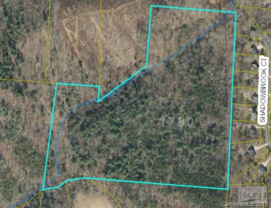 Great opportunity to own your very private estate. Property is very secluded once you enter the parcel through the Belmont Subdivision. Property has some creek frontage and portions have mature timber.