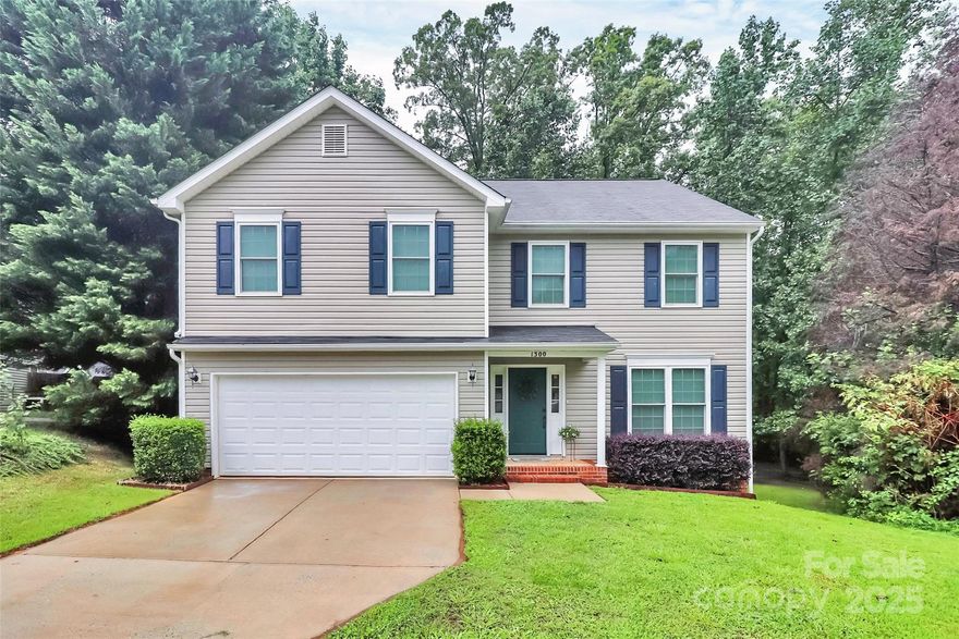 Welcome Home! Your new address is situated on a cul-de-sac lot with a large private back yard overlooking the trees. Hosting 4 bedrooms and lots of space at 2247 sq ft + 2 car garage (additional 408 sq ft). Enjoy your updated kitchen featuring Granite countertops, tile flooring, SS appliances, island seating and open floorplan to breakfast area/greatroom areas. Upstairs you will find the Large relaxing Primary bedroom along with 3 additional bedrooms. Primary host large walk-in closet, attached bath w/dual sink vanity, garden tub & separate shower. Laundry room conveniently upstairs near all bedrooms. Clover school district.