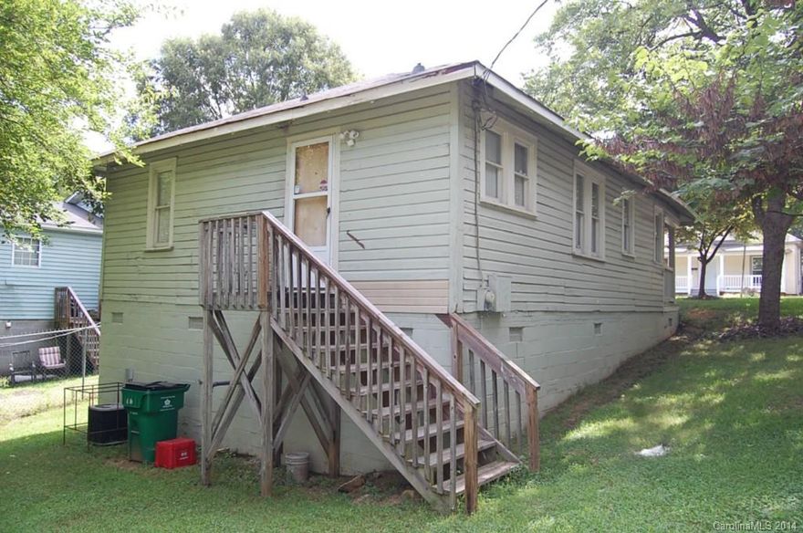 Bungalow on corner lot - former office of Belmont CDC - Offered for sale as-is, where is, seller to make no repairs. Home has some upgrades and updates to HVAC, plumbing, water heater and windows. Was formerly the office of the Belmont Community Development office. Great opportunity in a up and coming area. Short distance to NoDa - Greenway and Plaza Midwood.