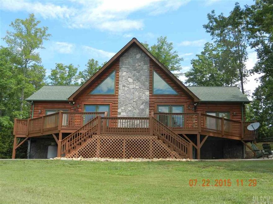 STUNNING CUSTOM OFF-FRAME MODULAR LOG HOME IS NESTLED AS A CENTERPIECE IN THE GATED COMMUNITY OF THE MEADOWS AT LAKE JAMES STATION. RELAX IN THE OPEN GREAT ROOM WITH PLENTY OF NATURAL LIGHTING, WALL TO CEILING STONE FIREPLACE, AND CATHEDRAL CEILINGS. ENTERTAIN ON THE EXPANSIVE FRONT DECK EASILY ACCESIBLE FROM THE GREAT ROOM, KITCHEN AND MAIN LEVEL BEDROOM. ALL THREE BEDROOMS BOASTS FULL PRIVATE BATHS AND PLENTY OF SPACE. KITCHEN HAS ALL STAINLESS STEEL APPLIANCES AND BEAUTIFUL CORIAN COUNTERTOPS. DOUBLE DETACHED GARAGE HAS PLENTY OF STORAGE INCLUDING AN ABOVE UNFINISHED ROOM. GATED COMMUNITY AMENITIES INCLUDE COMMUNITY POOL, WALKING TRAIL, PAVED ROADS, AND SERENCE LANDSCAPES.