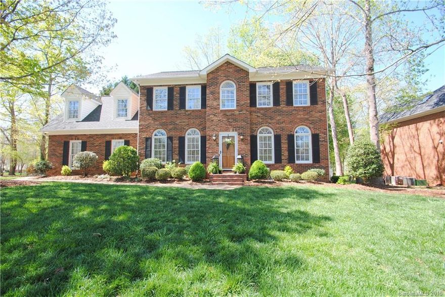 If you wait, you'll be late! This extraordinary home is ready & waiting! Stunning entry, gleaming hardwoods throughout main. GR w/gas fp, kit w/granite, tile backsplash & pantry. Fml DR. Spacious MBR w/tray ceil'g, his & her closets & glamour bath. Spectacular bonus w/hardwoods & wet bar. Dual staircase for private access to bonus. Screened porch off great room w/patio overlooking private yard. Storage building. Community amenities.
