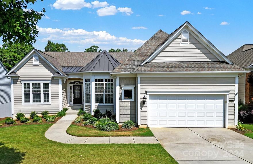 Cumberland Hall w/ an unfinished bsmt in beautiful Sun City, walking distance to the Lake House! Fresh neutral paint throughout, new LVP flooring in the main living areas, & new carpet in the bdrms! The eat-in kitchen features granite counters, electric cooktop w/ hood, a wall oven & microwave, a pantry, & a sunny bkfst nook. Get cozy around the fireplace in the spacious great room, or enjoy meals in the dining room. The large primary suite features a bathroom w/ a dual sink vanity, glass-enclosed shower, soaking tub, & a walk in closet. The 2 guest bedrooms are connected by a jack-and-jill style bathroom. The oversized screened deck leads out to the balcony deck, offering a private view of the woods. Downstairs, the unfinished walk-out basement offers a blank canvas for finishing it however you see fit! Other upgrades include Casablanca fans w/ programmable & dimmable lights, newer HVAC & hot water heater, 6" gutters at the rear of home, an irrigation system, & 2 French drains!