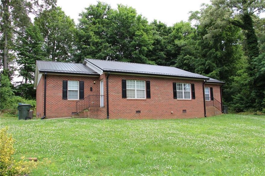 Well maintained and ready to move-in, all brick, 2 unit duplex.  With tenants already in place this property is a great buy for.  Each unit has 2 large size bedrooms, 1 full bathroom, kitchen, & oversized living room.  Some updated flooring recently in unit B.  Laundry hookups in closet & paved driveway.  Call now to see this income producing property.