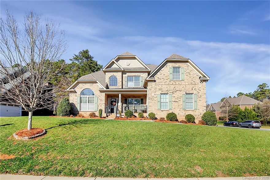 All brick custom home on a premium corner lot with 1st floor master! Grand, two story foyer with a formal dining and living room on either side. The large family room, featuring a gas fireplace and coffered ceiling, is open to the breakfast room and kitchen. The kitchen has tons of cabinet storage, with a double wall oven, center island, SS appliances and granite countertops.  Upstairs features a large loft/play room off the back and two hall baths. Each of the HUGE 4 guest bedrooms features tray ceilings and walk in closets. One owner home, home was built in 2013 but was only lived in for the past few years. Carpets upstairs have barely been walked on. See attachments for all the upgrades owners have done in the home, one of them being the two story 3 car garage. A garage loft was added that can be used as a work out space or storage with its own entrance from the butlers pantry. The main garage floor has recessed lighting and two ceiling fans underneath the loft with a TV hookup.