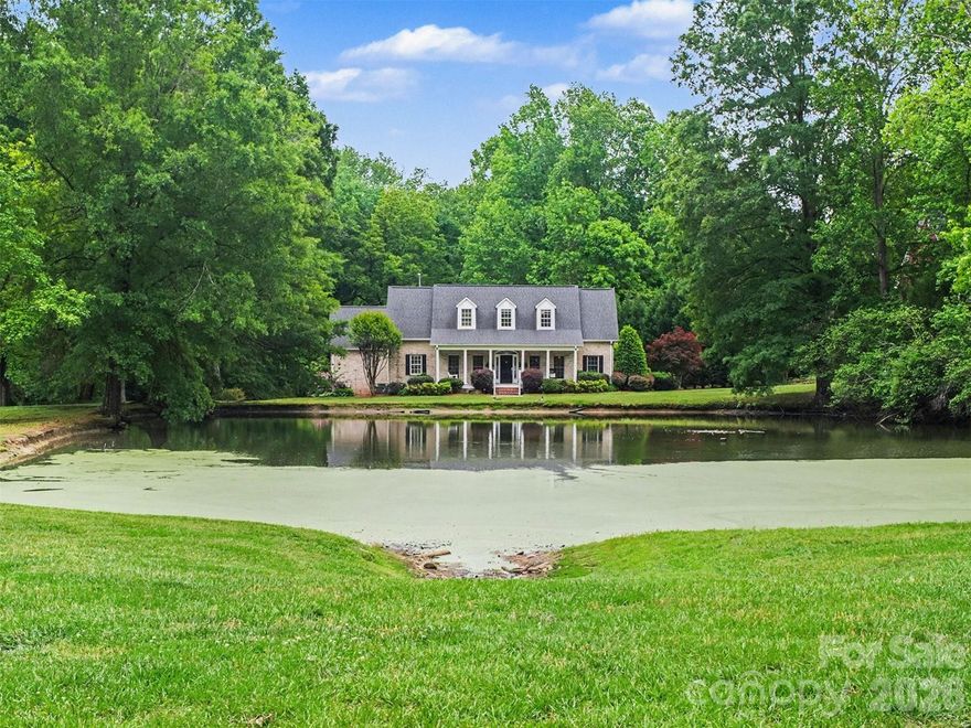 Welcome to this charming brick home nestled on a quiet cul-de-sac with lovely pond views all year round.  Set on just over an acre, the property immediately stands out with its inviting covered front porch—perfect for rocking chairs and morning coffee—overlooking a beautifully maintained lawn and mature landscaping.
Inside, natural light pours through oversized windows and elegant openings, highlighting the spacious living areas designed for both comfort and entertaining. The main living room centers around a cozy fireplace and pool views, while the adjoining dining spaces and bright breakfast nook create an easy flow for gatherings. The kitchen offers generous cabinetry and workspace, complemented by views of the backyard and surrounding greenery. A dedicated office and flexible bonus spaces provide room to work, relax, or host guests with ease.
Upstairs and throughout the home, bedrooms are generously sized with a calm, airy feel, and views of the pond or pool from every bedroom. A spacious DOWNSTAIRS primary suite features a spa-like bath with a large glass-enclosed shower, as well as beautiful garden tub.
Step outside to your own private retreat where an in-ground pool is surrounded by a patio and lush landscaping, creating an ideal setting for summer days and evening entertaining. Beyond the backyard, the property enjoys a sense of privacy with wooded views, while still being part of a welcoming neighborhood.
Oakview Commons offers scenic amenities including a tranquil community pond and picturesque surroundings that encourage evening strolls and outdoor enjoyment. Located in Salisbury, the home provides convenient access to local dining, shopping, and commuter routes while maintaining a peaceful, tucked-away atmosphere that feels miles from the everyday. Upstairs HVAC 2023, roof 2020 and kitchen appliances 2022. Must experience this retreat in person!