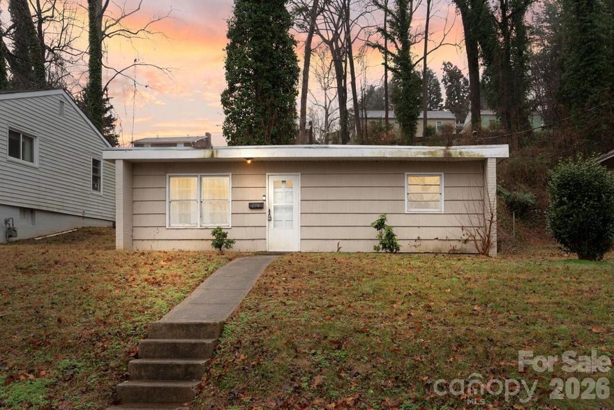 2 BD / 1 BA property in Washington Park features a functional layout with spacious living area that is open to the kitchen area. Jack-n-Jill style full bath between both comfortably sized bedrooms. Whether you're looking to add to your rental portfolio or searching for a property with potential, 238 Bond St presents a solid opportunity. Property has previously been used as a rental. Owners are NC licensed real estate brokers.