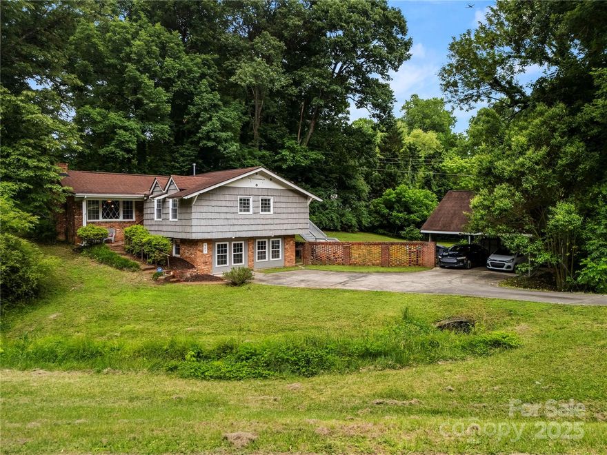 Located in popular Coulwood, this beautiful 3 bed/3.5 bath home is well-maintained.  The house is bounding with features! Starting on the exterior, you'll find a detached 2 car carport with a multi-car driveway in the front and a private backyard with a fire pit and cute bridge. Step inside and find spacious rooms to your left, 2 bedrooms to your right, and the open kitchen straight ahead.  Both bedrooms on the main floor have private baths and the half bath is conveniently located nearby. Two fireplaces upstairs are opposite each other and the third is downstairs. The basement is mostly finished with the remaining bedroom, full bath, flex space, laundry, and bonus interior room; the perfect place to decompress at the end of a day.  There is direct access to the backyard from the basement, so when you are ready to socialize, or recluse a little more, head out back and enjoy the space. Located close to local shopping, dining, and easy highway access! And best of all...NO HOA!