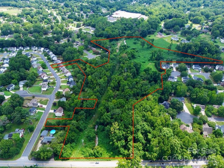 Rare opportunity to own a large tract of land in Rock Hill! This property offers a great opportunity to own land for recreational use and possibilly some build sites (check with the City). The land features mature trees and a creek that winds through the property, creating natural beauty and privacy. Access is available from Kallarama Rd, Ebinport Rd, or Hollythorne Dr.