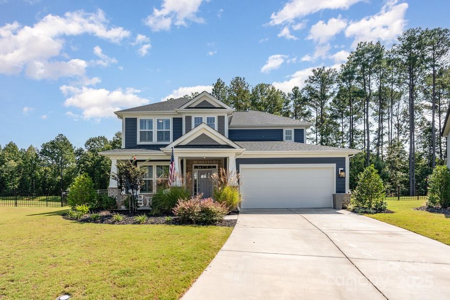 This stunning 4-bedroom, 3.5-bathroom home is in the highly sought-after Paddler’s Cove subdivision in Clover, SC. Nestled on a quiet cul-de-sac,home offers space and serenity with a spacious fenced in yard. Inside,Bright, open rooms designed for comfort and functionality. Gorgeous kitchen, complete with high-end appliances, is a centerpiece for both cooking and entertaining.Enjoy the brick patio and the screened-in porch.Easy access to Lake Wylie,this property is a perfect place to call home.