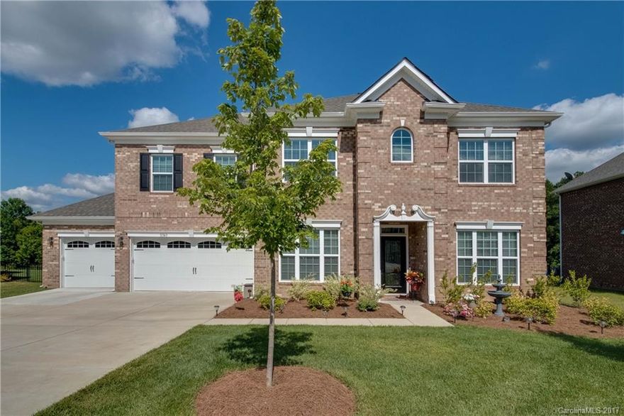 Desirable Harrisburg area / Hickory Ridge Schools! Immaculate 5 bed/4 bath w/Bonus, Office & Sunroom. Full brick/3 car garage. Almost new (built Dec 2015) and $95/sq foot! Deluxe kitchen w/granite, SS, walk-in pantry & butler's pantry. Hardwoods thru-out 1st floor. Bedroom & full bath on main. Master suite w/tray ceiling & luxury bath w/granite. Raised vanities/ceramic tile in all baths. Flat lot w/extra large patio & lovely private backyard views. Amenities: pool, trails, lake. Close to I-485!