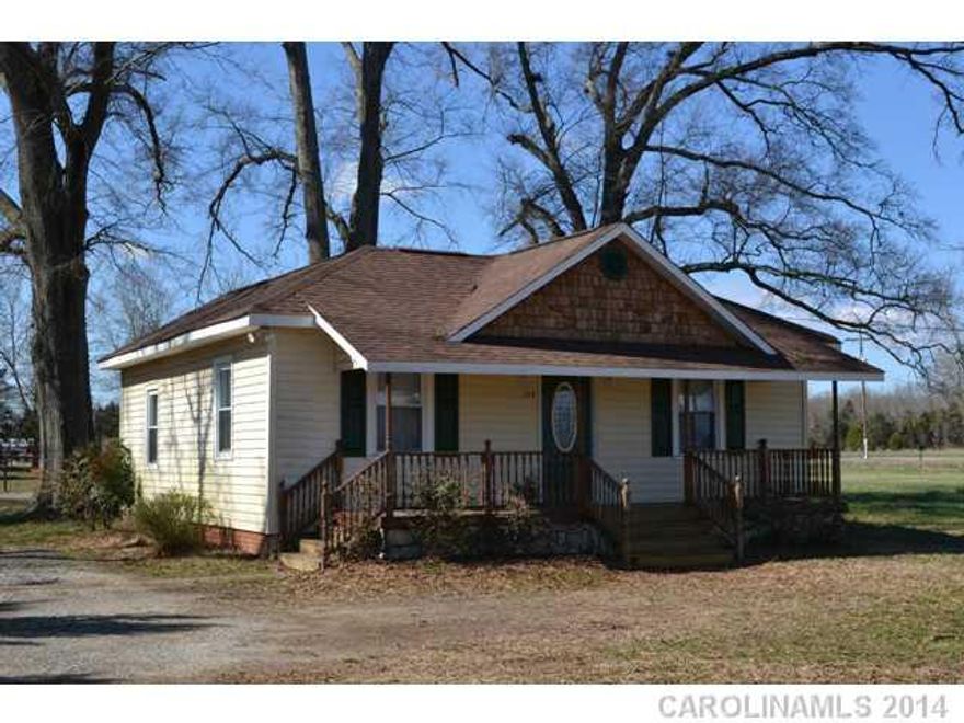 Great older home sits on an acre lot!  Large rocking chair front porch, great room with fireplace.  Spacious kitchen and eating area.  Roof is approximately 4-5 years old.  Some hardwood floors, some replacement windows.  Office could be used as a second bedroom.  Fence is approximately 5 feet over line.  There will be a range installed!