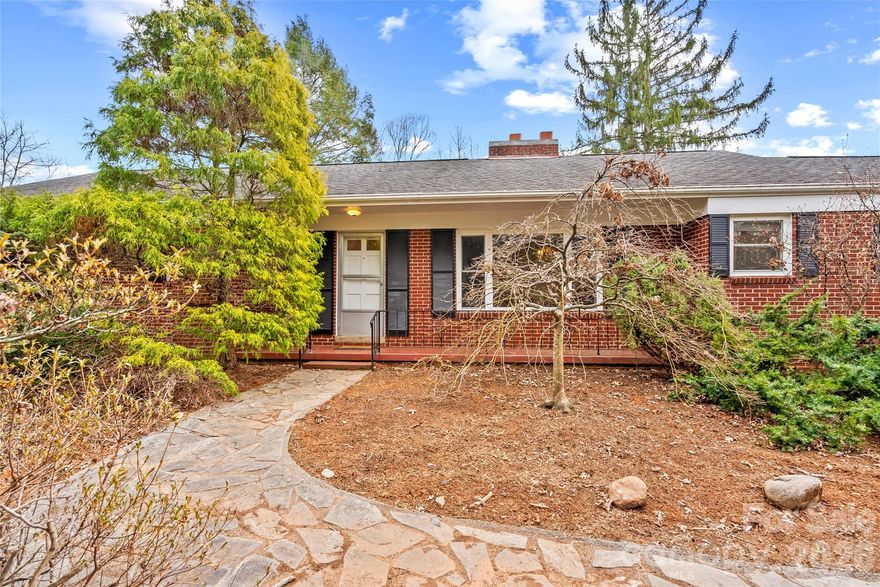 Charming 3 bedroom, 2 bathroom brick ranch home located at 474 N. Main Street with hardwood floors and a walk-up attic offering additional storage or expansion potential. This home has great bones and is ready for your personal touch. Enjoy a spacious sunroom and a private backyard, perfect for relaxing or entertaining. Conveniently located just a short walk from downtown Mars Hill, with easy access to Asheville and Johnson City. Property includes a bonus buildable lot, providing excellent investment or expansion opportunities.