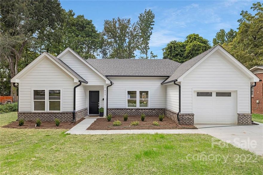 Check out this gorgeous new construction home in the heart of Charlotte, just minutes from all that the Queen City has to offer! This stunning ranch home is loaded with upgrades like elegant quartz counters, 9ft ceilings throughout, and beautiful tiled, frameless showers. Small touches like a tray ceiling in the primary suite, luxury vinyl planking, and a spacious, open floorplan remind you that you're living the luxurious life, and features like spray-foam insulation and designer LED lighting make sure you don't spend too much to maintain it. Built by an experienced and high quality builder, this traditional-style home boasts an exterior with a splash of brick and a black gutter system which gives it a unique and classy look from the outside. This split-bedroom sits on a huge flat lot with no HOA, giving the new owner the space to create their own piece of heaven, while still being close to Charlotte's best cultural and social spots like Camp North End and Noda! Get your tour today!