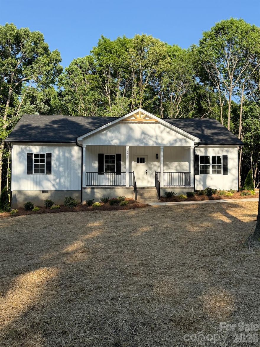 Brand New Construction on 1.5 Acres in Marshville! Enjoy the privacy and flexibility of country living while still being just a short drive to Monroe and the bypass. This newly built 4-bedroom home sits on a spacious 1.5 acre lot tucked off a quiet road with plenty of room to add a future garage, shop, or outdoor space.
Inside you'll find an open concept layout with 9-foot ceilings, upgraded soft-close cabinetry, granite countertops, and waterproof laminate flooring throughout the home. This floorplan offers privacy for the primary suite while keeping the living, dining, and kitchen spaces open and functional for everyday living or entertaining. Additional bedrooms and flex space offer a wide range of use to give the homeowner incredible flexibility and storage capacity.
The rocking chair front porch welcomes you home, while the large lot offers endless possibilities with little restrictions and county-only taxes. A one-year builder warranty provides added peace of mind for the new owner.
If you're looking for new construction with land, privacy, and room to grow, this home checks all the boxes.