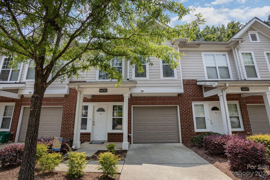 LOCATION, LOCATION, LOCATION! This townhome in located in a prime location and desirable community! Your main floor has updated luxury vinyl plank and neutral paint throughout. Computer niche is prewired and convenient for working from home. Living room is completed with gas fireplace and open to kitchen and dining area. Kitchen features granite counters, tile backsplash and breakfast bar for a great entertaining flow. Off of the dinning room is patio perfect for outdoor grilling and enjoying your wooded view for extra privacy. Upstairs contains two master suites! One is a large primary w/private ensuite and lovely wooded view! Ensuite features large custom tile shower and updated dual vanity w/quartz counter. Second bedroom also has private ensuite with walk in closet! The updated townhome is conveniently located to all that Ballantyne has to offer and just across the border is Fort Mill! Don't miss out on this unit!!