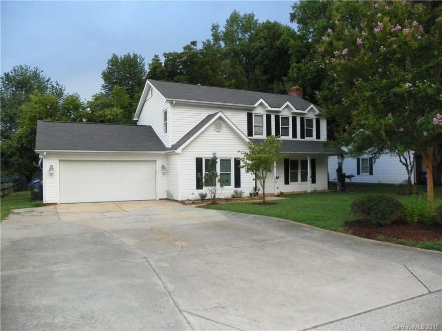 !!! GREAT MATTHEWS FAMILY HOME WITH BEAUTIFUL GRANITE KITCHEN, TILE BACKSPLASH + NEW CABINETS & BAY WINDOW BREAKFAST !!!  LAMINATE FLOORING THROUGH-OUT (No Carpet Anywhere) / Covered Front & Back Porches + Adjoining Deck overlooking Fenced yard & HUGE GARAGE/SHOP.  UPDATES INCLUDE: windows, roof, garage door opener, HVAC Compressor & High Efficiency Gas Furnace, Kitchen Appliances, All 3 Water Closets, Window Blinds + Beautiful Front Door & Storm Door / No Houses Behind You = Great Privacy !!!