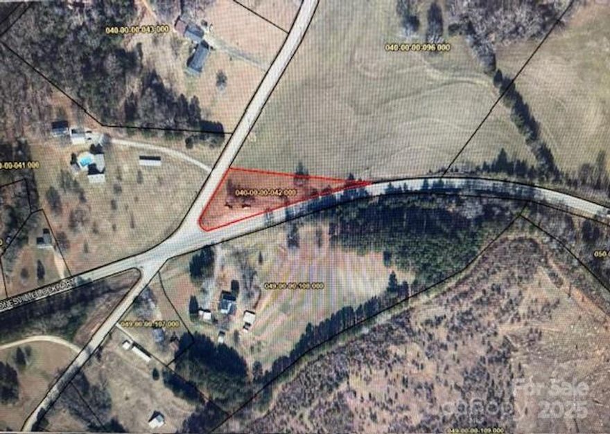 For sale: 1-acre lot located at the corner of Highway 9 and Highway 105.