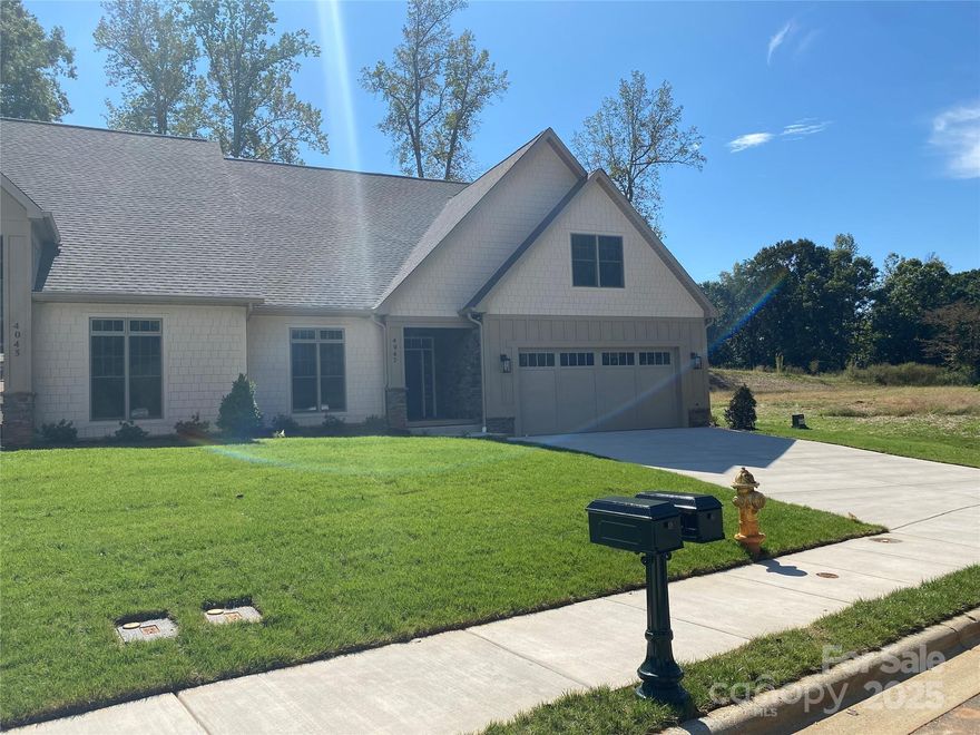 Beautiful townhome in Rock Barn Country Club and Spa. Lawn and outdoor bld maint included, Bonus/flex space upstairs. Tile in kitchen and bathrooms, lots of elbow room with this great kitchen layout. Primary on the main level.
It's a must see! Last one left.