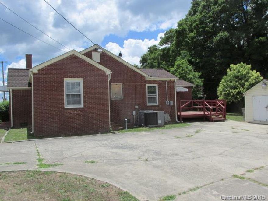 Single Family house on lot zoned C1.Oversized circular concrete parking area. Includes storage out building.
House is full brick with apprx 3-4 year old roof. Could create interior to office style floor plan .Good price for small business location.