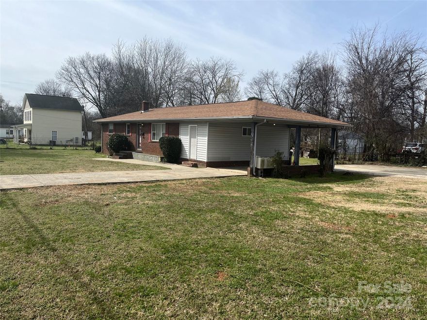 This 'Full Brick Ranch Home' is perfectly located on a corner lot in the established and desirable Lakewood Community. The home offers timeless appeal of the brick exterior and good structure. Sitting on .34 acres, the lawn is spacious with immense potential for a lush landscape & vegetation. A storage shed with electricity and completely fenced & gated yard add to the possibilities to complete an attractive outdoor space.  With three bedrooms, one tiled bath & a 1/2 bath there are multiple ways to create a charming living space. The large kitchen provides enough space for meal preparation and dining. The den area off of the kitchen does not have a register and is not added into the heated sq ft. Heat source is from the kitchen and storage area. Hardwoods are under the carpet throughout most of the house.
The neighborhood is in a welcoming location of the city.
This home is Sold As Is.