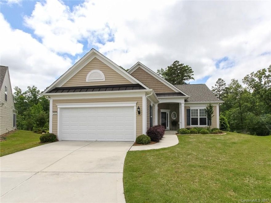 Pristine Surrey Crest model 2BR/2BA w/sunroom sits on .23 acre, quiet cul-de-sac lot with privacy and woods viewed from your 24x13 deck.  The interior features beautiful dark hardwoods, ceiling fans, gas fireplace and canned lighting.  The kitchen has Corian counters, black appliances, pendant light, slate backsplash and much more.  Come check out the community and the active adult lifestyle of Sun City Carolina Lakes