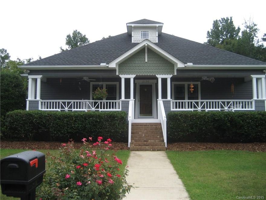 Charming craftsman home on corner lot with view of community wooded 5 acre park with walking trails from your covered front porch. Fenced in backyard with lots of room for entertaining outdoors or just to enjoy your tree lined view from the patio. This beautiful home has hardwoods through out most of the home, vaulted ceiling in the great room, built in shelving in one of the guest bedrooms & wired for surround sound system in great room, front porch & garage. One year home warranty provided.