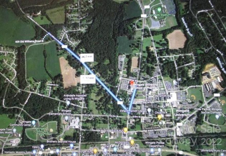 DEVEKOPERS ! WINGATE  SOUTH SIDE OF BYPASS IN CITY LESS THAN 1 MILE TO UNIVERSITY AND MAIN STREET/ DOWNTOWN AREA OVERLAY !.  117 ACRES +/- Which fronts Old Williams Road on one side and dead ends at Bypass 1800+/- Road Frontage , and Maye street  on other side , 710+/- Road Frontage  . Site  provides 2 access points for development in this desirable area. 3 parcels , 09049001, 09049003, and 09049004 . These parcels are considered in the comprehensive plan to be village residential and outer village property. They support residential development of medium City Water and Sewer . Currently R-20 .Town  wants higher end mixed residential product  and will not allow super high density home builders with an entry level market product . Last 3 buyers have all tried  to buck the Towns desires and have not been approved .Developers with a better product, mixed use plan will be allowed leeway in the density requirements .
