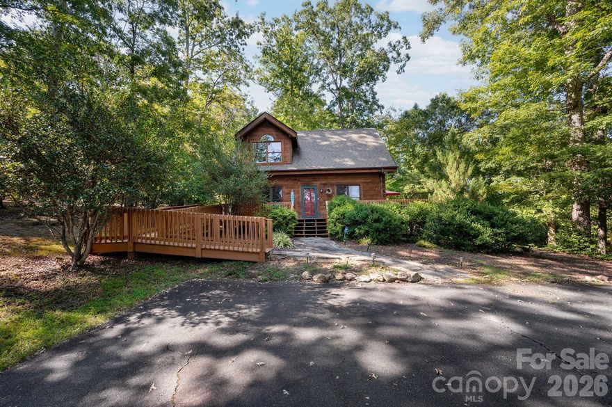 Nestled on over three private, wooded acres in the peaceful Laurel Lakes community, 117 Laurel Lakes Parkway offers a charming mountain retreat close to Lake Lure. This cozy log cabin features 2 bedrooms, 2 bathrooms, and a warm, inviting interior with a gas-log fireplace and lofted primary suite.
Surrounded by nature, the property features a circular driveway, and access to a private community lake for fishing, kayaking, and relaxing outdoors. Currently used as a successful short-term rental and family getaway, it’s ideal as a personal sanctuary, full-time home, or investment property—capturing the essence of laid-back mountain living.
Sellers are offering an $8,000 credit and are open to negotiating some furnishings. As this is an active rental, NO DRIVE-BY'S, PLEASE!
