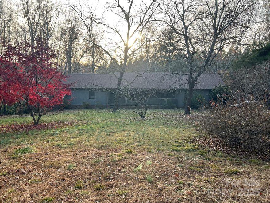 Major Price Enhancement! Welcome to your Country Estate! This charming one-story home with basement offers peace and tranquility on 2.73 unrestricted acres. Enjoy your mornings on the large front porch, taking in the quiet surroundings.

Upstairs features a 3-bedroom, 2-bath layout with a great natural flow. Don't miss the unique hand doorbell as you step into the foyer—just one of the many character touches you'll find here.

The basement is plumbed for a future bathroom and includes a woodstove to warm the floors on chilly nights. Upstairs, cozy up by the gas logs, whether you're entertaining or relaxing. Home is heated by propane HVAC.

You'll find two carports with main-level attic access, plus a one-car garage door in the basement, ideal for a workshop or extra storage.

With no restrictions, this property is full of potential—perfect for a hobby farm, workshop, or simply enjoying life in the country. Endless possibilities await!