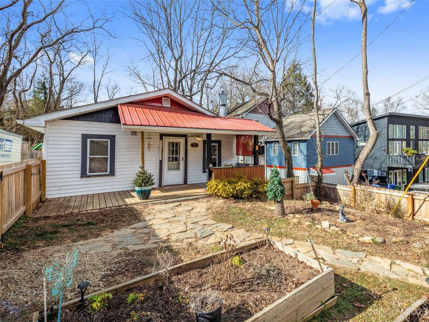 Sweet bungalow, prime location close to River Arts District & East-West AVL. restaurants & coffee shops. 
Covered front porch and large back deck. Many updates including new windows & exterior doors, new hot water heater, kitchen appliances & concrete counter tops. Organic raised bed garden and picket fence in front. Unique features including a cedar lined outdoor spa room with hot tub. Artist studio in back, fully fenced lot provides privacy.  Back yard is cleared and ready for your dream landscape. Quiet street.