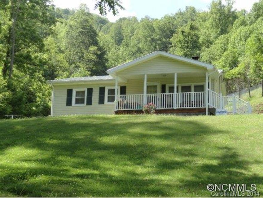 7 ACRES - private, Snug & Cozy Cottage you could live in while building higher in the mountains then use as guest house or rental income. Used as 3 bedrooms but no closet in 2 of the bedrooms. Front porch. 14'X24'8" Workshop/utility. Spring water supply, small brook. Could live off land here.  Fenced garden, pasture, woods, private. If you want a mountain hide-away with potential - check this one out.