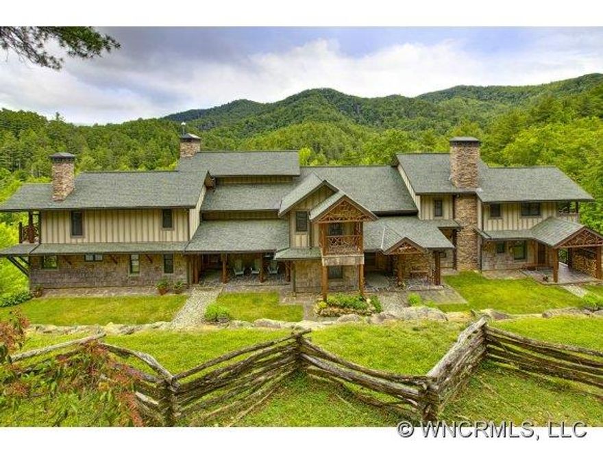 Private retreat w/150+ acs bordered by 63K acres of national forest.  9000+ sqft home designed for adaptive use by individuals, families, or groups.  Stands of healthy Hemlocks as well as many other hardwds + creek, views and abundant flora color the landscape of this truly unique property.  Conservation easement possibilities for land = potential benefits for new owners. 45 mins north of Ashville.
