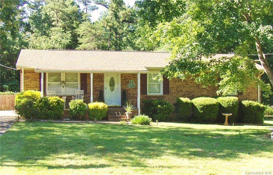 Full-brick ranch with 3 bedrooms, 1.5 baths on .36 acre lot. Lovely home with new laminate wood floors, open floor plan. Home has 1250 square feet. Living room, dining and kitchen are open to allow for great entertaining/family space. Full bath has been totally remodeled. Roof is 6 years old. Heat pump - 8 years. Large deck overlooks the 16x32 in-ground swimming pool with sliding board & diving board. New pool liner & gorgeous corner ceramic tile steps. Great price for a home with a pool!!