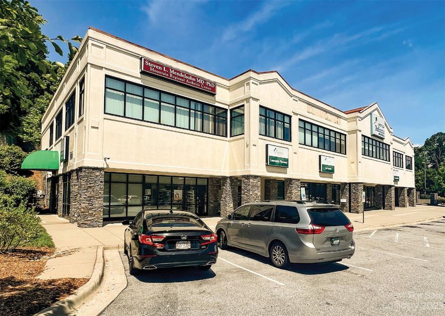 2,358 SQFT turnkey medical office condo located within the prestigious Regional Medical Park anchored by Mission Health, Asheville Eye Associates, Advanced Dermatology & Skin Surgery, PML Pathology, Rockcliff Oral
and Facial Surgery Center and Biltmore OBGYN. High-end interior finish, 10' ceilings, move-in ready. Superb access to major commercial arteries. Only 4/10ths mile from I-40 Exit 51. Built 2006. Wet sprinkler. Street-level entrance. Unit 700 within Regional Medical Park Plaza Condominium. Owner-occupied by Mountain Regional Arthritis Center since 2007, to be delivered vacant at closing as owner is retiring. ***SEE BROCHURE FOR MORE INFORMATION***