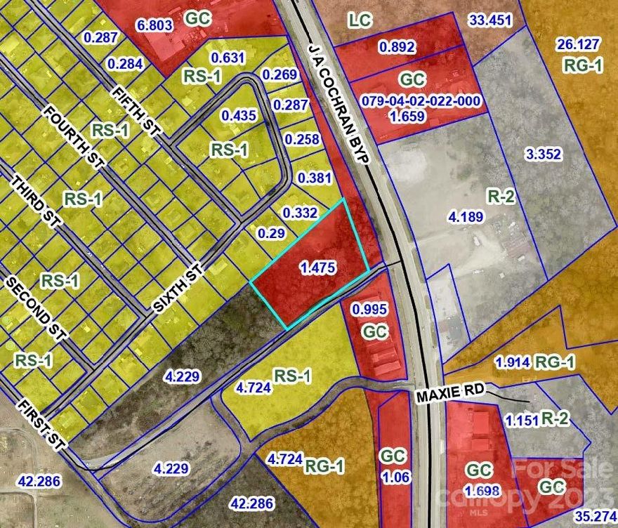 1.48-acre lot located on JA Cochran Bypass (Hwy 72) Great location for any business. GC (General Commercial) zoning allows for a wide variety of uses. Water and Sewer nearby. Don't miss out on this opportunity to invest in valuable commercial real estate.