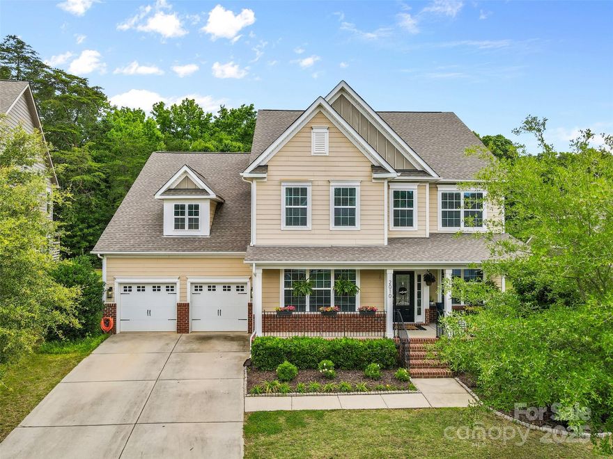 Nestled in a serene setting w/in a gated & amenity-rich community, in sought-after Clover Schools w/Primary Suite & laundry on MAIN LEVEL! Enjoy the convenience of a HUGE primary bdrm w a custom closet & en-suite bathroom. Open-concept & beautifully designed floor plan, seamlessly connecting gourmet kitchen, family room, and breakfast nook. The Chef's Kitchen is equipped w double ovens, gas cooktop, large island & custom pantry.  Upstairs is an enormous Bonus Room/Flex/5th bedroom! Step outside into an Outdoor Oasis w screened-in porch, paver patio, & cozy outdoor fireplace overlooking a large, flat & fenced in backyard w fruit trees & garden boxes! Take advantage of the community Pools, Playground, Fitness Ctr, Trails & private marinas on Lake Wylie. Don't miss the opportunity to own this home that combines elegance, functionality, & a prime location. Recent updates: bdrms, dining room & study freshly painted, Custom shelving, Tankless H2O Heater & storage racks in garage.