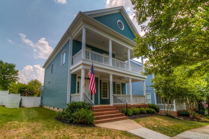 Gracious Charleston style home with 2 extended front porches. All the conveniences of Baxter Plus Open Spaces! Located on quiet circle overlooking pocket park w/fountain. Just one block from Community Center, pool, trails and tennis courts.  Fantastic updates include stainless steel appliances, fresh paint, new carpet, new hardwoods, new granite countertops, newer HVAC (3 yrs). Tall ceilings and tons of custom moldings. Private, fenced backyard with patio.  Enjoy all Baxter has to offer!