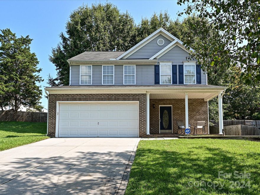 Ready to move in gorgeous. This home is a jewel & seller is looking forward to working with you! It features an open floor plan, crown molding, designer lighting, wide plank Pergo floors, & surround sound in the family room. Beautiful, upgraded granite counters, BRAND NEW microwave, prep island, roll-out cabinets, & wooden shelving in the pantry. The owner's retreat includes two closets, a shower, & separate sunken tub. Spacious secondary bedrooms have an updated bath with ceramic tile. Three fantastic outdoor living spaces: an oversized front porch perfect for your morning coffee or dinner, an enviable side yard, & a private fenced in backyard, the neighborhood is rich in amenities, including an Olympic-sized pool, clubhouse, multiple playgrounds, a community library, sidewalks, RV/boat storage, & a food truck calendar. Located in the Clover School District with great benefits: Low SC taxes, USDA approval. Great location, close to shopping & restaurants. Hot water heater:1 year-old.