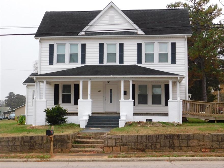This beautiful 2 story has plenty of room to roam.   This house has 2 bedrooms, 1 bed/bonus room and one bath upstairs. Has 1 primary bedroom downstairs and 1 bath  a home office, play room or flex space.3 fireplaces that are not functional at this time 2 were converted to gas logs (Never used by current owner) original built ins, large kitchen with butlers pantry.  Large front porch. Large screened back porch.  A New survey has been completed. The tax map for this property has not been updated to show the true lot.